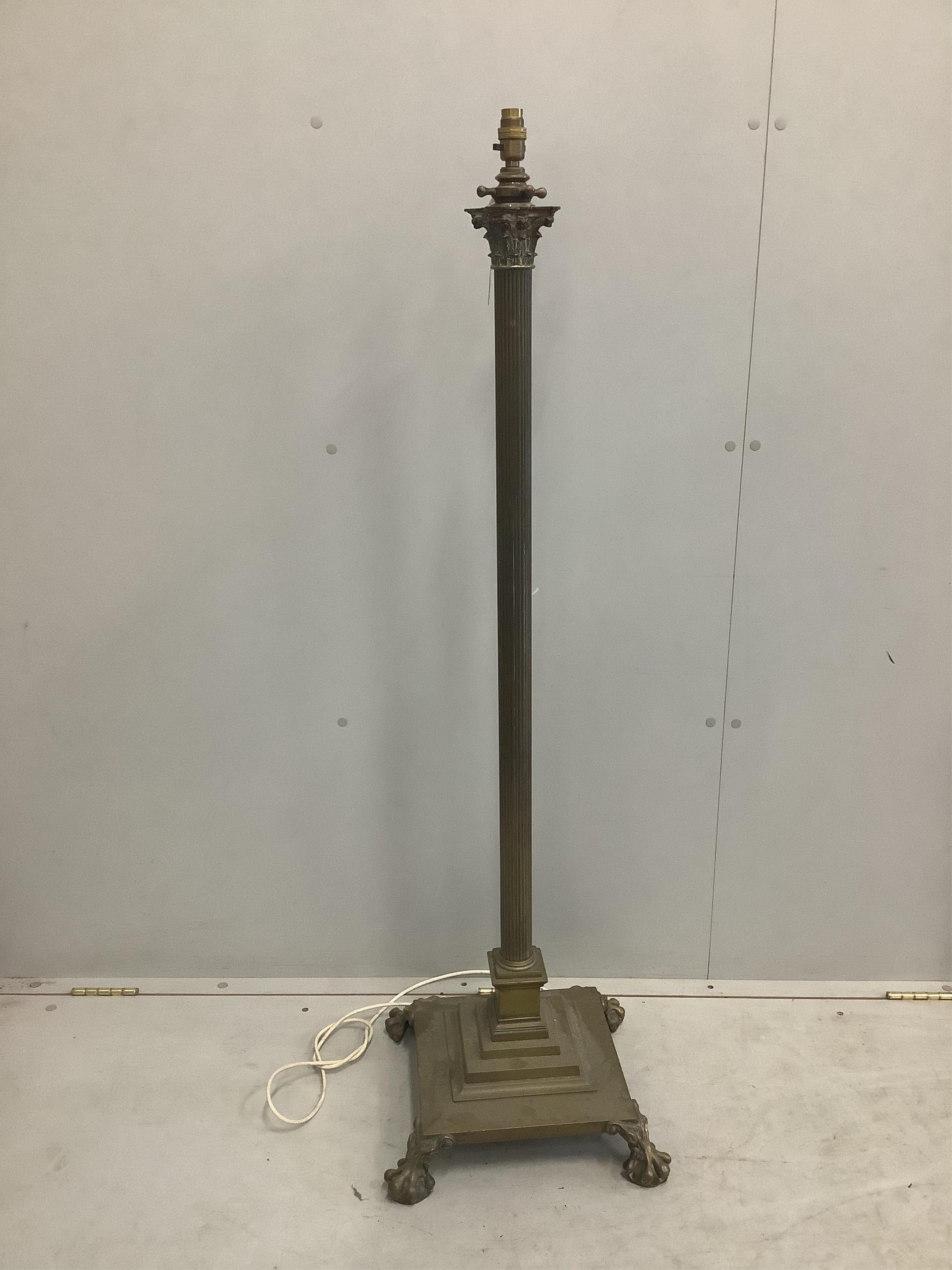 An early 20th century brass Corinthian column telescopic standard lamp. Condition - fair